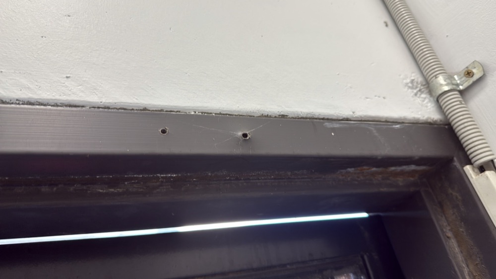 Door hardware damaged, noted during a pre-purchase inspection in Deer Park, in Melbourne's west