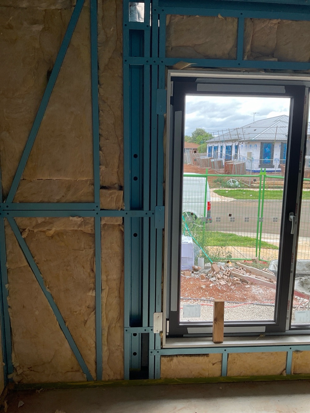 Bridging points left unfilled with insulation, noted during a lock-up inspection in Melton South